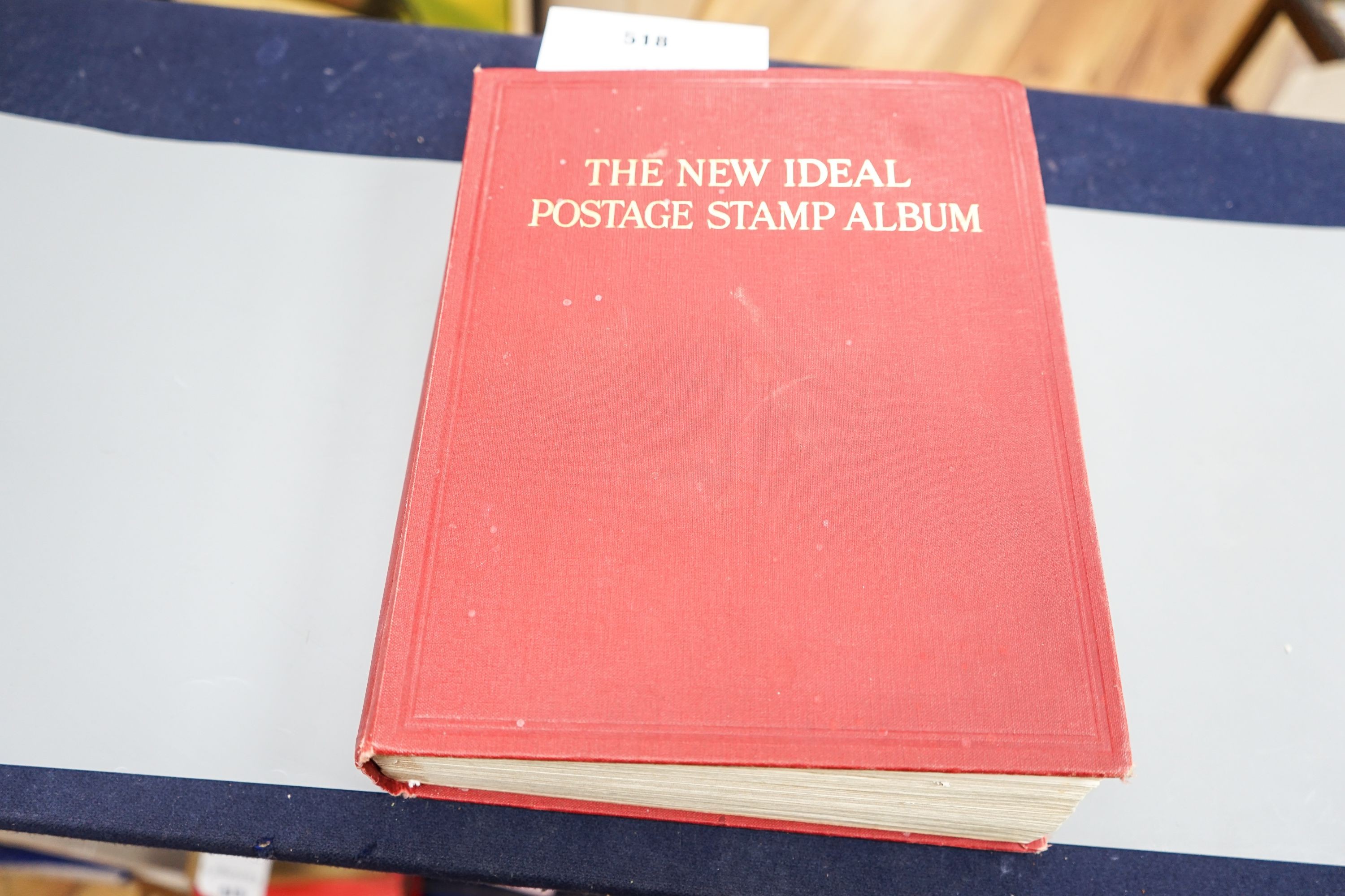 A large well-filled New Ideal Postage Stamp Album